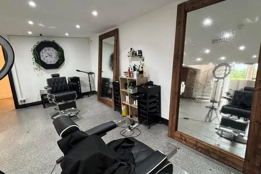 A barbershop floor cleaned and ready for customers